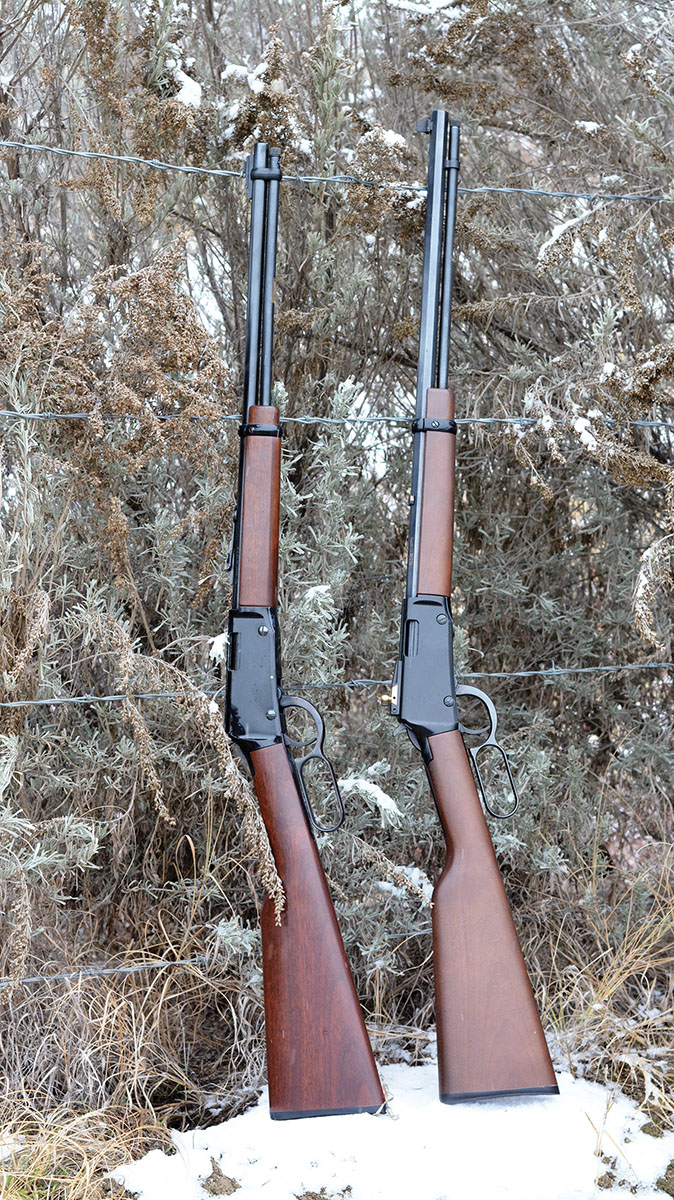 The first Henry Lever Action rifle No. H001 (left) was chambered in 22 Long Rifle and featured an 18½-inch round barrel with carbine-style hardware and boasts of more than one million units being sold. The Henry Lever Action Octagon Frontier 22 Magnum No. H001TM (right) features a 20½-inch barrel, traditional features, American walnut stock and a blue finish.